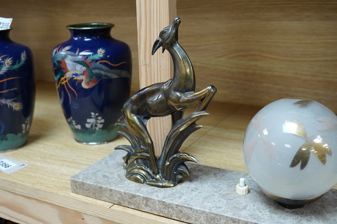 A French Art Deco gilt metal and marble ‘deer’ lamp, 30cm long